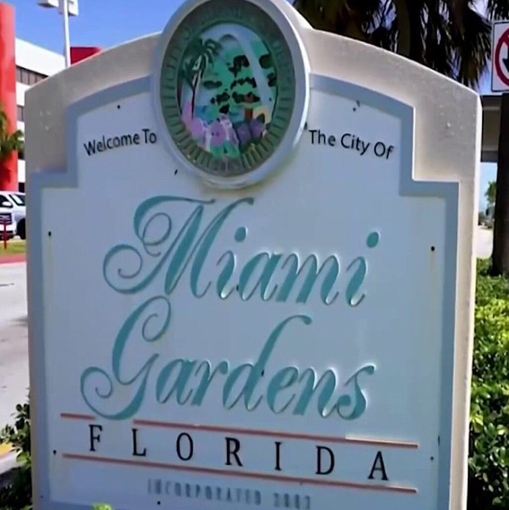 Miami Gardens Florida Sign Board in white and Sea Green Color