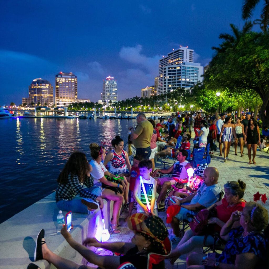 West Palm Beach night view with people having fun with their familiies