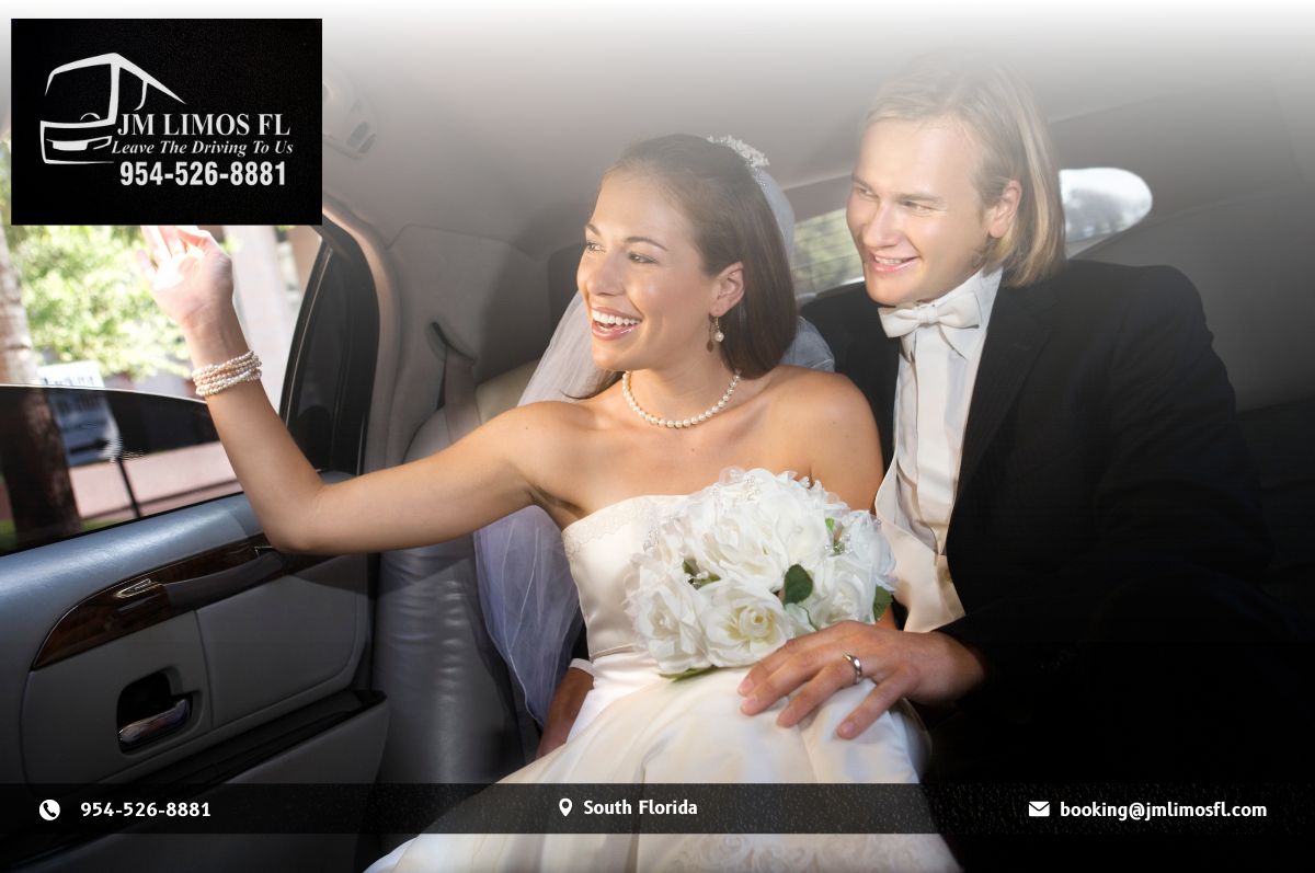 Beautiful Couple in Black Hummer limo enjoying their wedding
